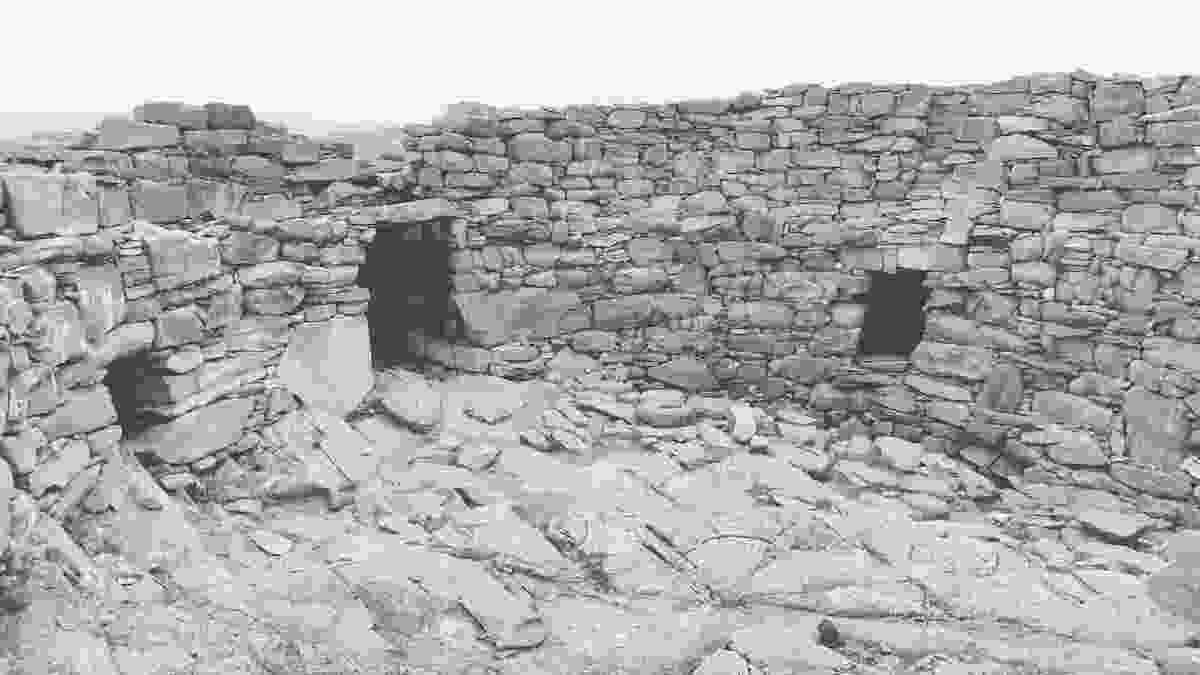 The main entrance in the middle, and two dark side rooms either side