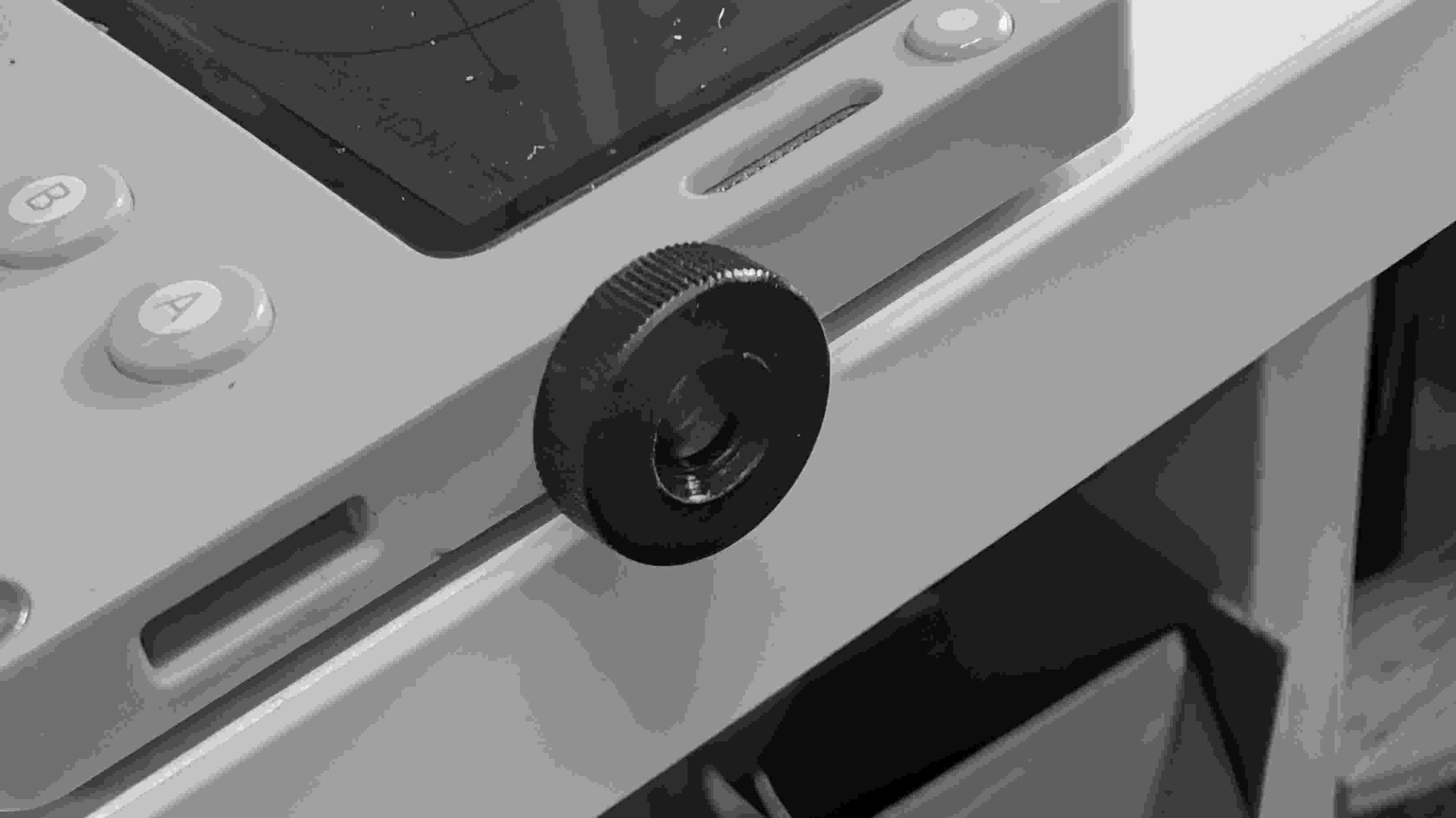 Black plastic knurled thumbwheel mod for Playdate